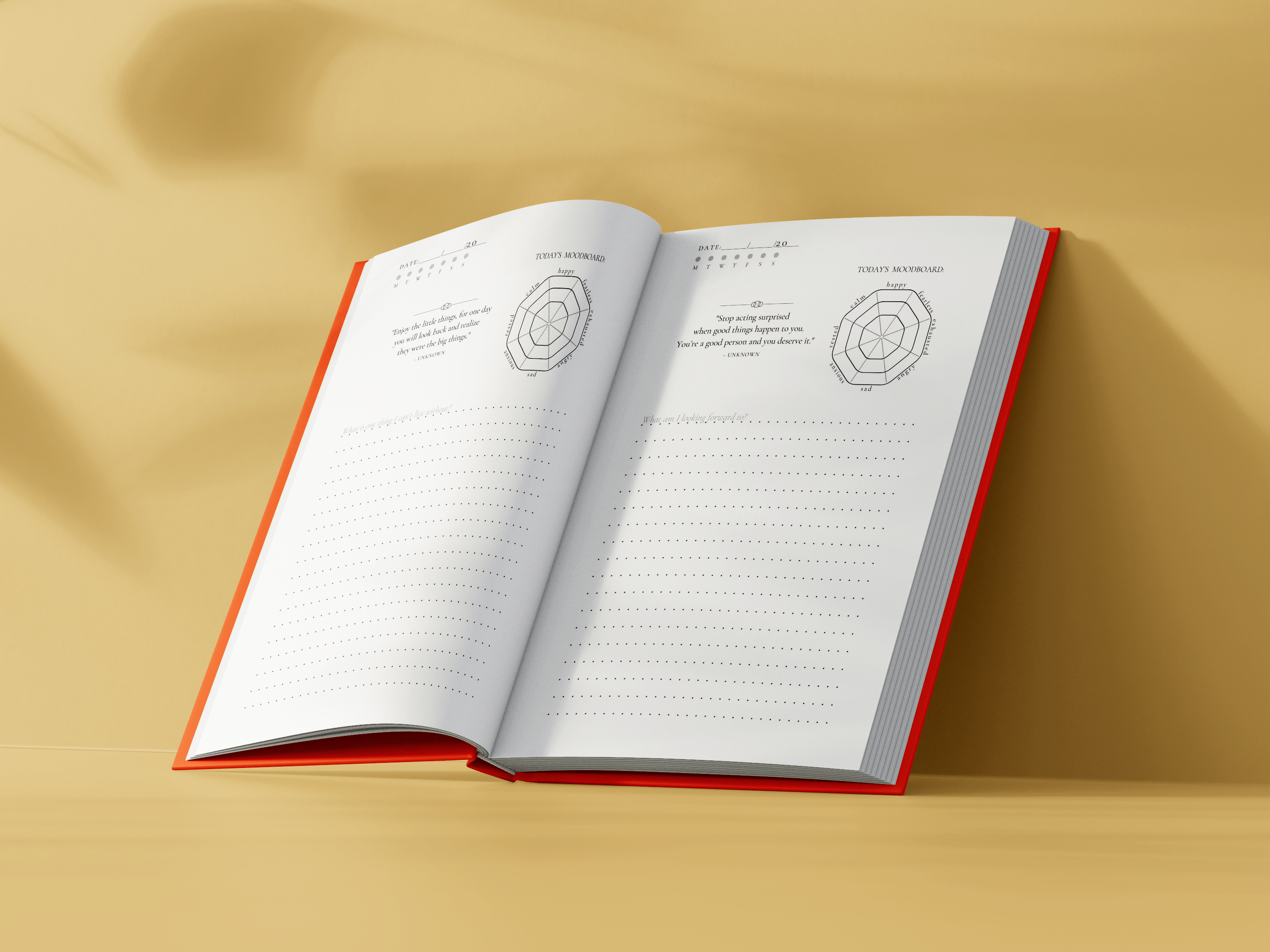 Open journal showing beautiful pages with writing prompts